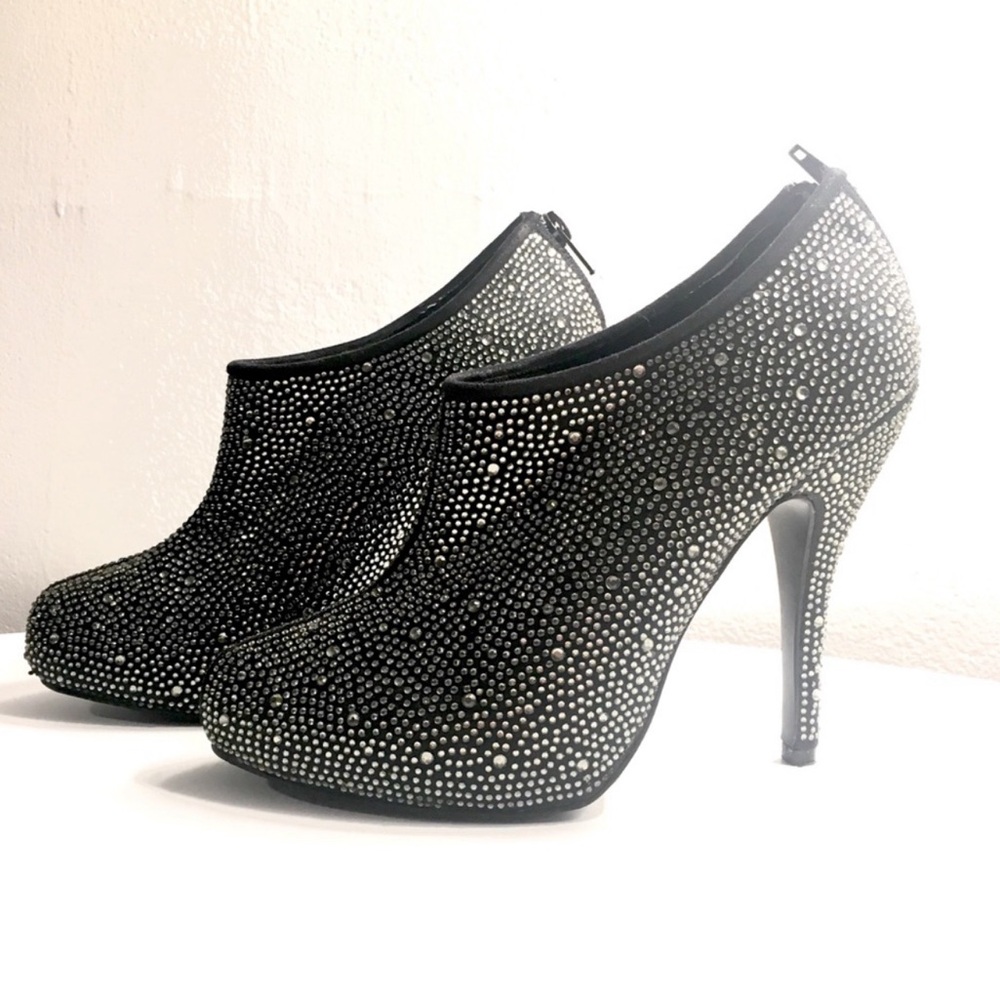 Steve Madden size 7.5 crystal booties. 4 inches tall